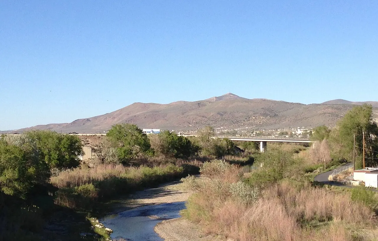 Elko – Elko, Nevada: 18 21 31 Elko Mountain viewed from downtown Elko in Nevada with the Humboldt River in the foreground